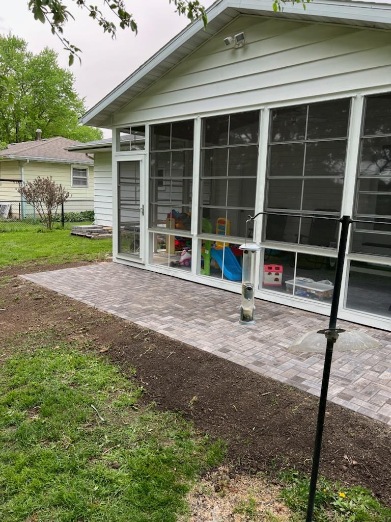 A small backyard paver patio installed by Oakhaven Contractors near Madison, WI.